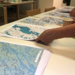 Restoration and catchment area maps being handed out.