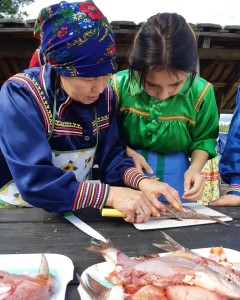 Older women taught the fish handling skills to the younger girls during the Festival 2019.
